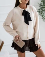 Πλεκτή ζακέτα με κουμπιά και διακοσμητικό φιόγκο - Image 2